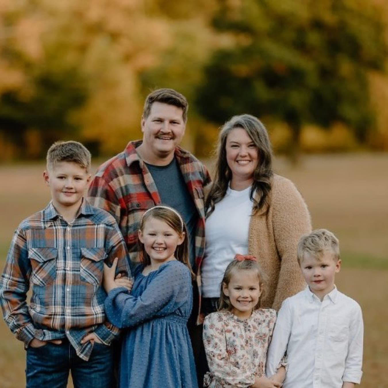 Jeffery and Alyssa Peck with their kids.