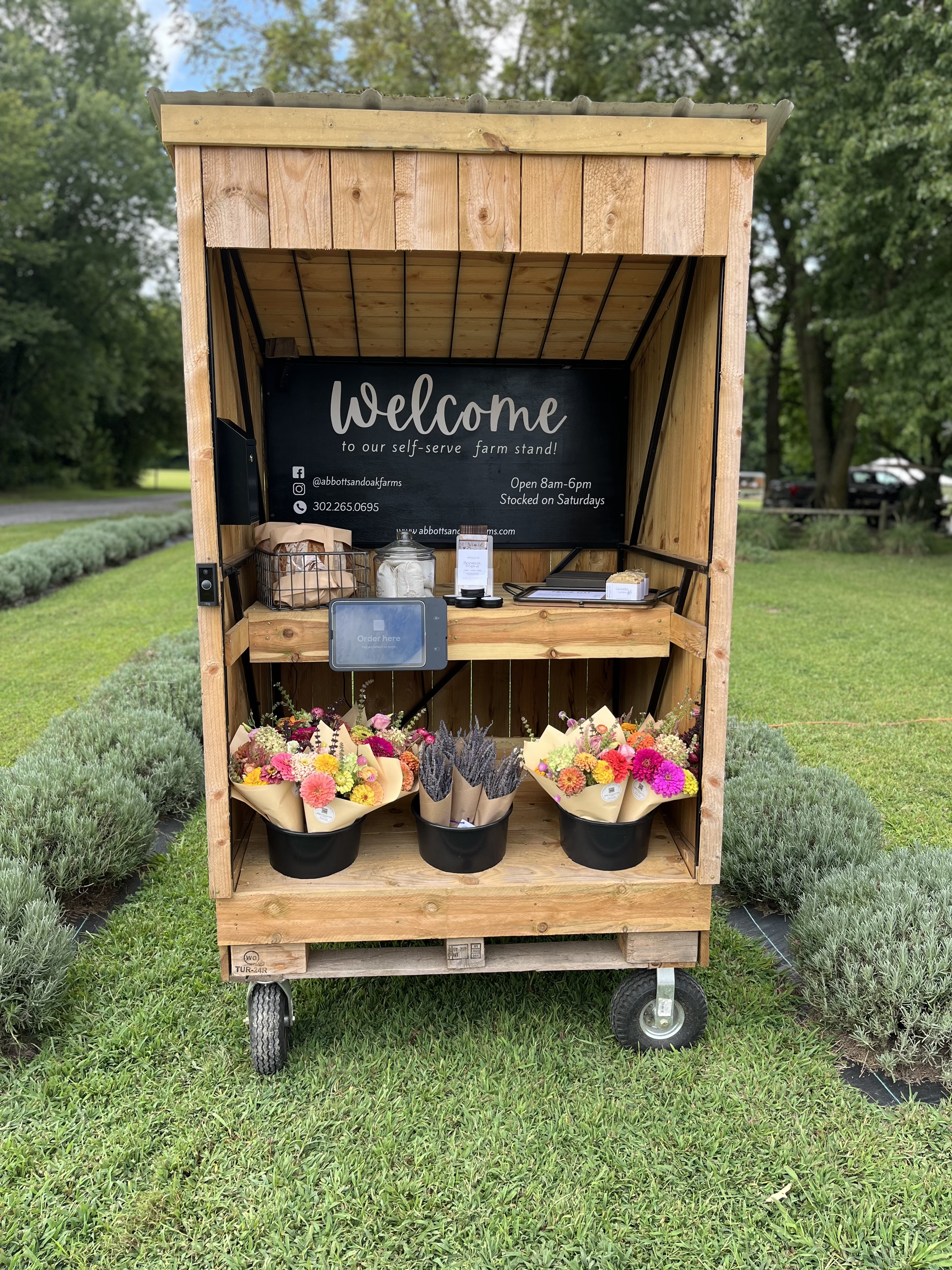 The Abbott's & Oak farmstand stocked with seasonal goods